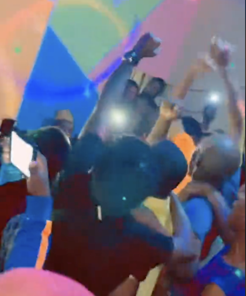 Dancing crowd sings along and makes stabbing motions during performance of "Stab the Fxxxxts" (Photo courtesy of Tiktok)